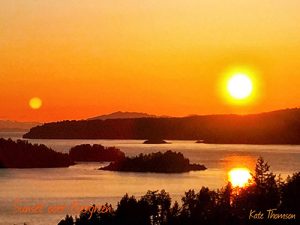 visitor accommodation Bowen Bay's Nest sunset from patio deck